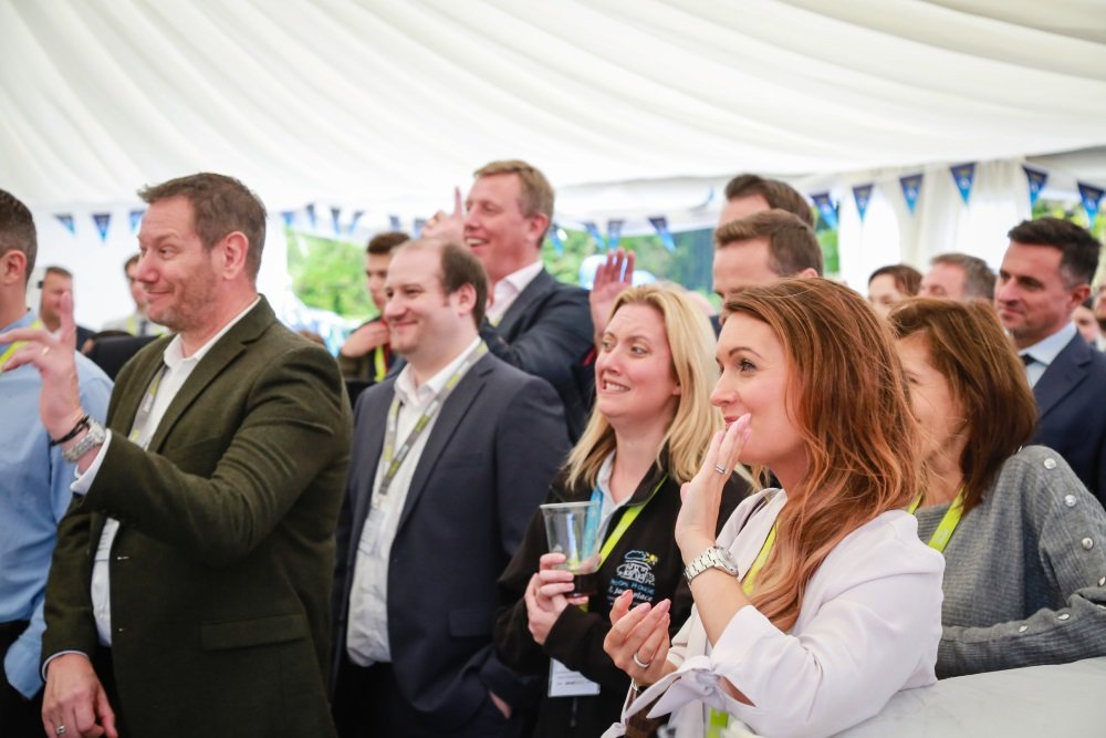 aerial direct staff celebrating the official launch party