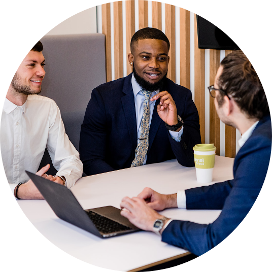 staff members talking during a meeting