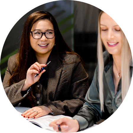 aerial direct staff talking within a meeting