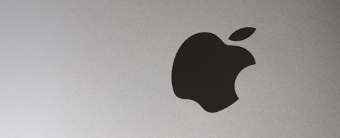 Black Apple logo on a grey gradient background